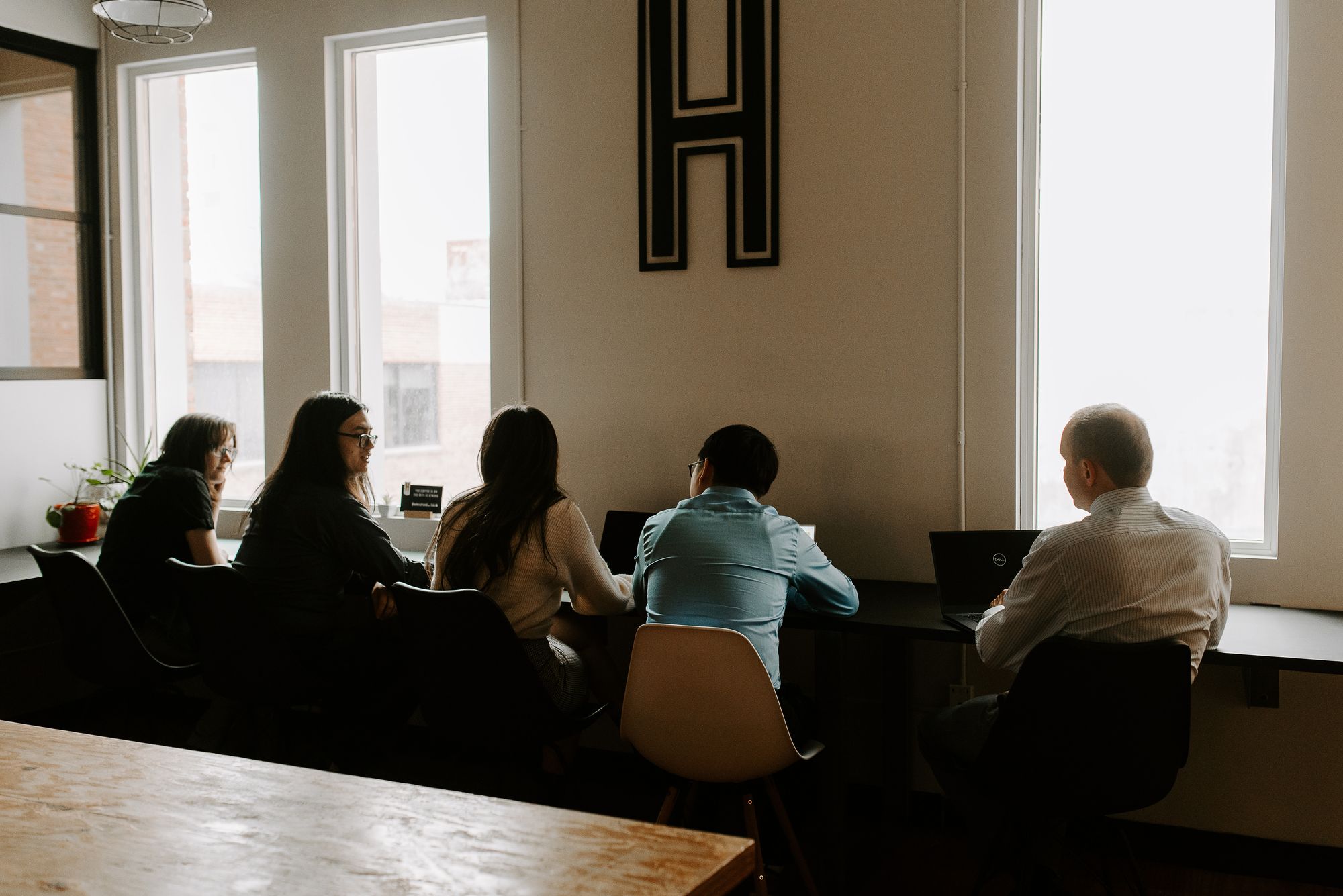 Kickbyte team discussing marketing strategy